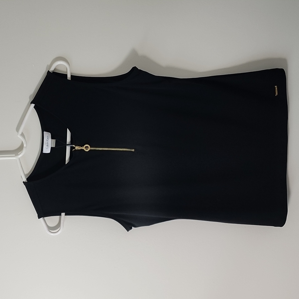 Calin Klein black blouse.